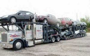 truck hauling cars